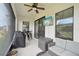 Spacious covered patio with comfortable seating area at 4062 Cadence Loop, Land O Lakes, FL 34638