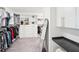 Large walk-in closet with ample shelving and drawers at 4062 Cadence Loop, Land O Lakes, FL 34638