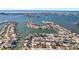 Wide aerial showcasing waterfront community at 5708 Bayshore Dr, Seminole, FL 33772