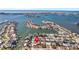 Aerial view of home and surrounding neighborhood at 5708 Bayshore Dr, Seminole, FL 33772