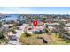 Aerial view showing home's location in a waterfront community at 5708 Bayshore Dr, Seminole, FL 33772