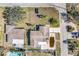 Aerial view showing house, yard, and pool at 5708 Bayshore Dr, Seminole, FL 33772