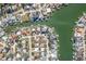Wide aerial view of neighborhood and waterways at 5708 Bayshore Dr, Seminole, FL 33772