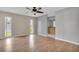 Primary bedroom with laminate wood floors and ceiling fan at 5708 Bayshore Dr, Seminole, FL 33772