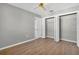 Spacious bedroom with wood flooring and large closet at 5708 Bayshore Dr, Seminole, FL 33772