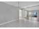 Bright dining room with tile floors and access to patio at 5708 Bayshore Dr, Seminole, FL 33772