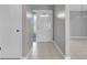 Bright entryway with tiled floor and interior door at 5708 Bayshore Dr, Seminole, FL 33772