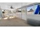 Bright and airy Florida room with ample seating at 5708 Bayshore Dr, Seminole, FL 33772