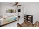 Cozy bedroom with ceiling fan and ample closet space at 6226 Hampton N Ct, St Petersburg, FL 33710