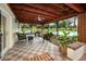 Relaxing screened patio with seating and pool view at 6226 Hampton N Ct, St Petersburg, FL 33710
