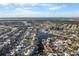 Wide aerial showcasing waterfront homes and canals at 713 Gran Kaymen Way, Apollo Beach, FL 33572