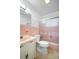 Pink bathroom with shower/tub and vanity at 713 Gran Kaymen Way, Apollo Beach, FL 33572