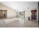 Spacious living room with large windows and terrazzo flooring at 713 Gran Kaymen Way, Apollo Beach, FL 33572