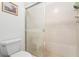 Bathroom with shower stall and toilet at 7713 Hillside Ct # 201, Hudson, FL 34667