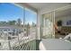 Screened lanai with patio furniture and view at 7713 Hillside Ct # 201, Hudson, FL 34667