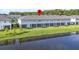 Aerial view of townhome near water at 8321 Wildflower Glen Ave, Odessa, FL 33556