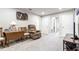 Finished basement with comfortable seating and ample space at 8321 Wildflower Glen Ave, Odessa, FL 33556