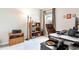 Home office with desk, chair, and ample natural light at 8321 Wildflower Glen Ave, Odessa, FL 33556