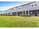 Exterior view of townhouses with private screened patios at 8321 Wildflower Glen Ave, Odessa, FL 33556
