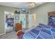 Bedroom with mirrored closet doors and en-suite bathroom access at 8954 Antigua Dr, Seminole, FL 33777