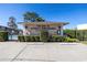 Village at Antigua Townhomes entrance with pool and guest parking at 8954 Antigua Dr, Seminole, FL 33777