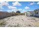 Spacious backyard with patio and wooden fence at 9608 Richwood Ln, Port Richey, FL 34668