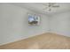 Light and airy bedroom with wood floors at 9608 Richwood Ln, Port Richey, FL 34668