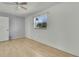 Spacious bedroom with light walls and wood floor at 9608 Richwood Ln, Port Richey, FL 34668