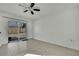 Bedroom with sliding glass door to backyard at 9608 Richwood Ln, Port Richey, FL 34668