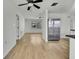 Open concept dining area with laminate flooring at 9608 Richwood Ln, Port Richey, FL 34668