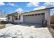 Updated home exterior with a large driveway at 9608 Richwood Ln, Port Richey, FL 34668