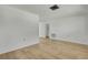 Bright living room with light wood laminate flooring at 9608 Richwood Ln, Port Richey, FL 34668