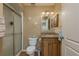Updated bathroom with granite vanity and walk-in shower at 102 Stafford Dr, Palm Harbor, FL 34684