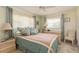 Bright bedroom with a double bed and ample closet space at 102 Stafford Dr, Palm Harbor, FL 34684