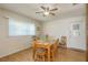 Charming dining room with wood table and chairs, and natural light at 102 Stafford Dr, Palm Harbor, FL 34684