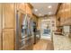 Modern kitchen with stainless steel appliances and granite countertops at 102 Stafford Dr, Palm Harbor, FL 34684