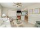 Cozy living room with comfy seating and adjacent dining area at 102 Stafford Dr, Palm Harbor, FL 34684