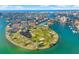 Waterfront property with lush green landscape and tennis courts at 10355 Paradise Blvd # 503, Treasure Island, FL 33706