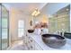 Modern bathroom with double sinks and a large walk-in shower at 105 Locust Dr, Brandon, FL 33511
