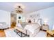 Relaxing main bedroom with plush bedding and ample natural light at 105 Locust Dr, Brandon, FL 33511