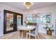 Charming breakfast nook with a round table and French doors leading outdoors at 105 Locust Dr, Brandon, FL 33511
