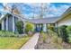Inviting front entry with walkway and landscaping at 105 Locust Dr, Brandon, FL 33511