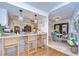Bright kitchen with island, stainless steel appliances, and light cabinets at 105 Locust Dr, Brandon, FL 33511