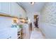 Bright laundry room with washer, dryer, and extra storage at 105 Locust Dr, Brandon, FL 33511