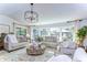Sunlit living room featuring comfortable seating and a stunning view at 105 Locust Dr, Brandon, FL 33511