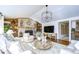 Open living room with a stone fireplace and hardwood floors at 105 Locust Dr, Brandon, FL 33511