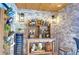 Rustic outdoor bar with wine storage and beverage tap at 105 Locust Dr, Brandon, FL 33511