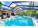 Enclosed pool and spa with outdoor kitchen at 105 Locust Dr, Brandon, FL 33511