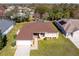 Aerial view of single-Gathering home with a large backyard at 1066 Larkin Rd, Spring Hill, FL 34608