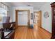 Bright bedroom with hardwood floors and a large closet at 1066 Larkin Rd, Spring Hill, FL 34608